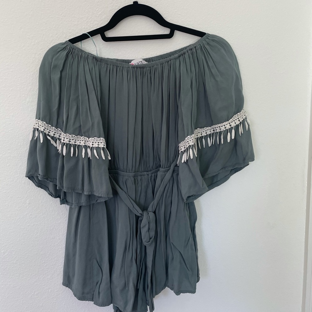 Off the shoulder romper with tassel detail